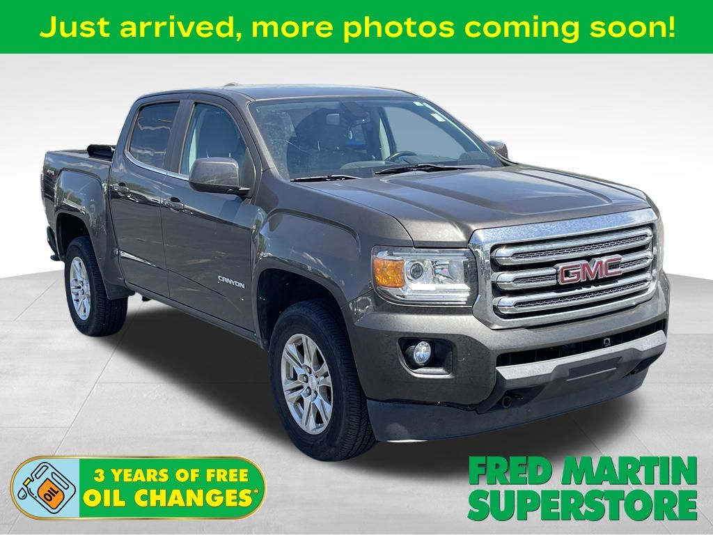 Smokey Quartz Metallic 2019 GMC Canyon SLE Crew Cab 4WD Pickup Truck Four-Wheel Drive 8-Speed Automatic
