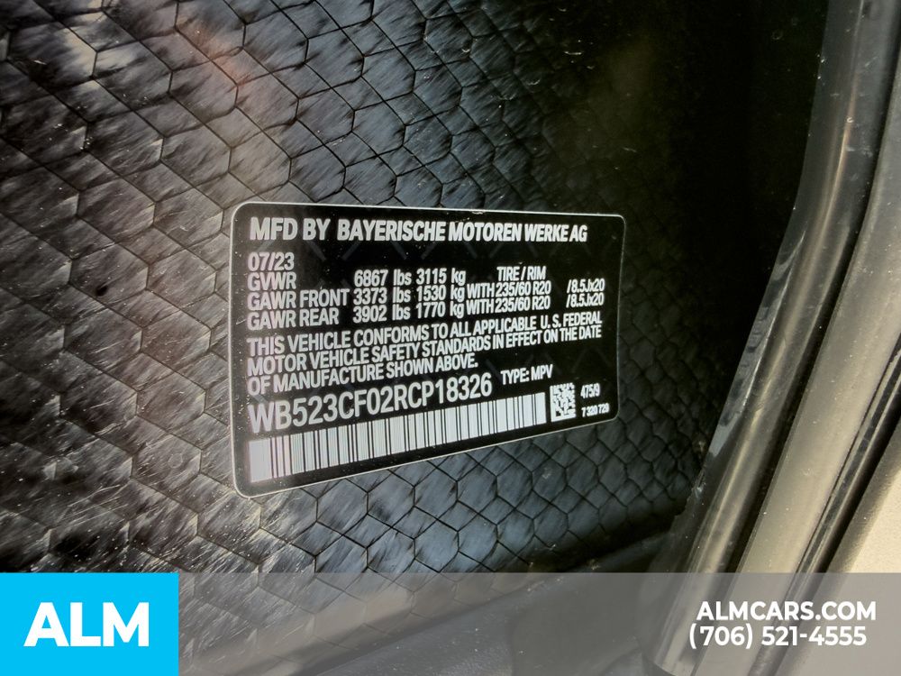 Used 2024 Black BMW xDrive50 image 37