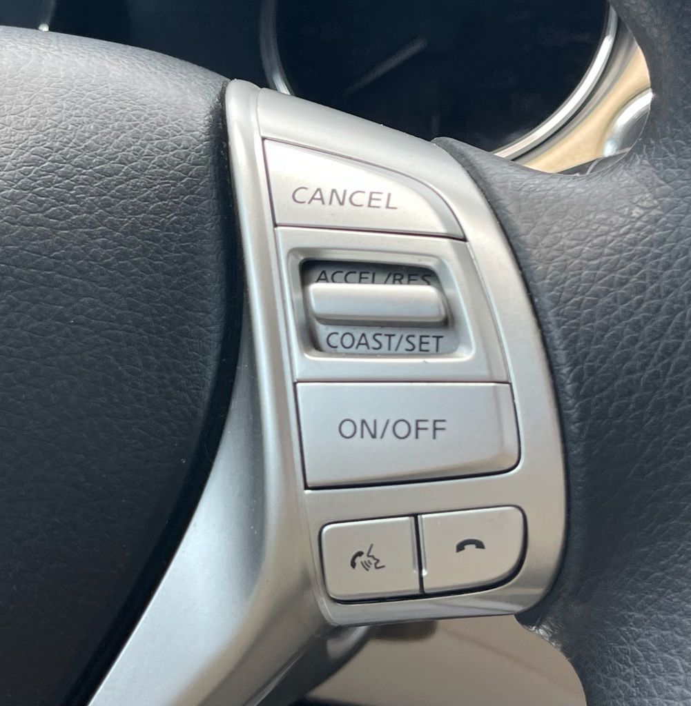 2016 Nissan Rogue SV Red at DeMontrond Gulf Freeway