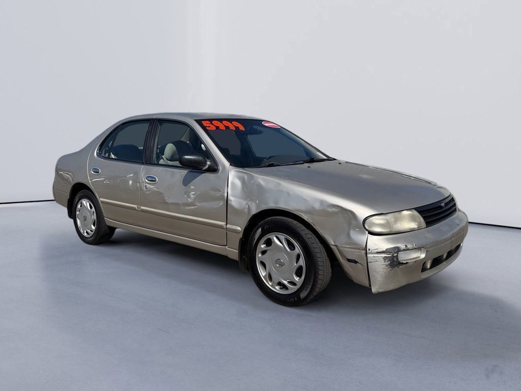 Champagne 1997 Nissan Altima XE Sedan Front-Wheel Drive 4-Speed Automatic