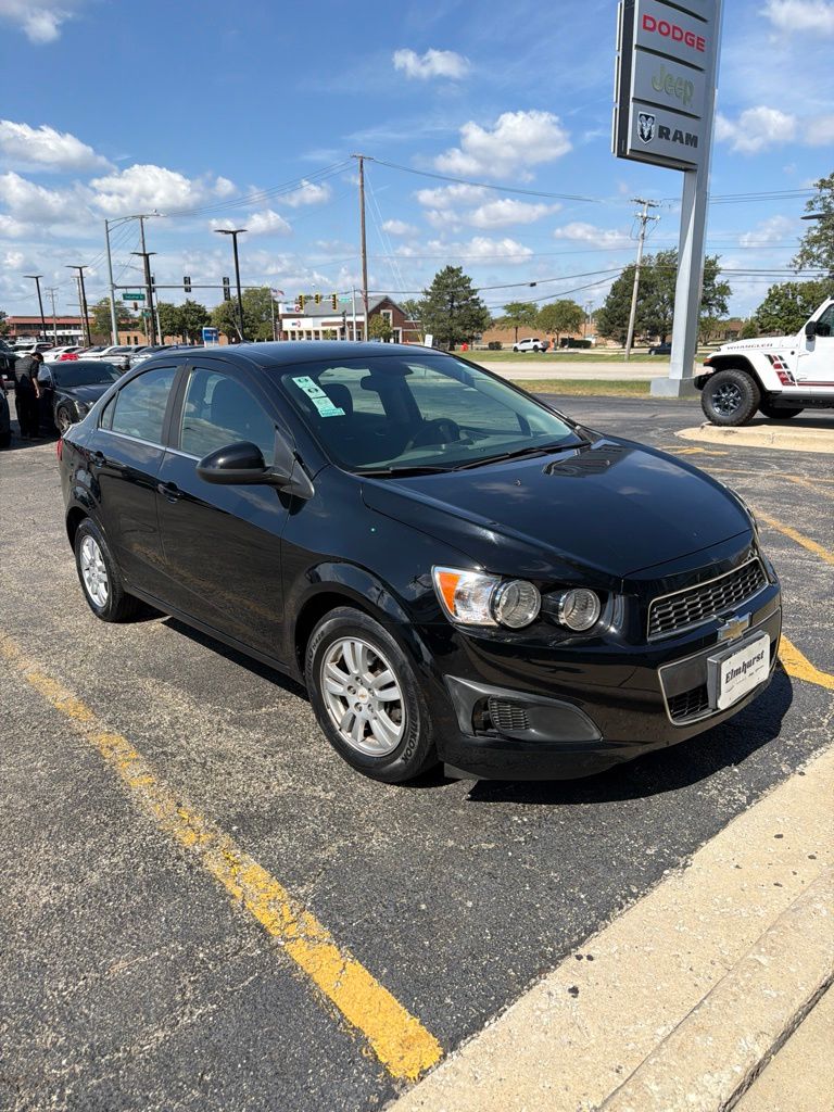 Black 2012 Chevrolet Sonic Sedan Front-Wheel Drive 6-Speed Automatic