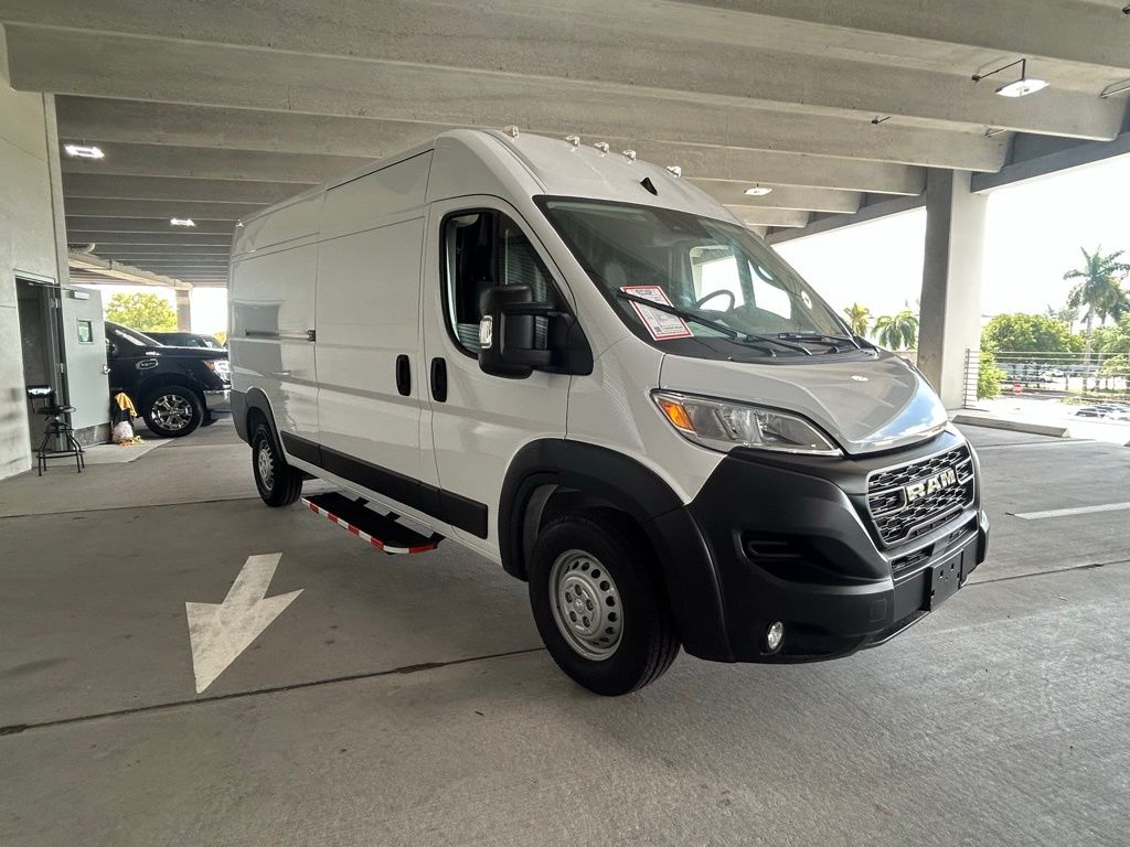 Used 2025 Bright White Clearcoat Ram High Roof image 7
