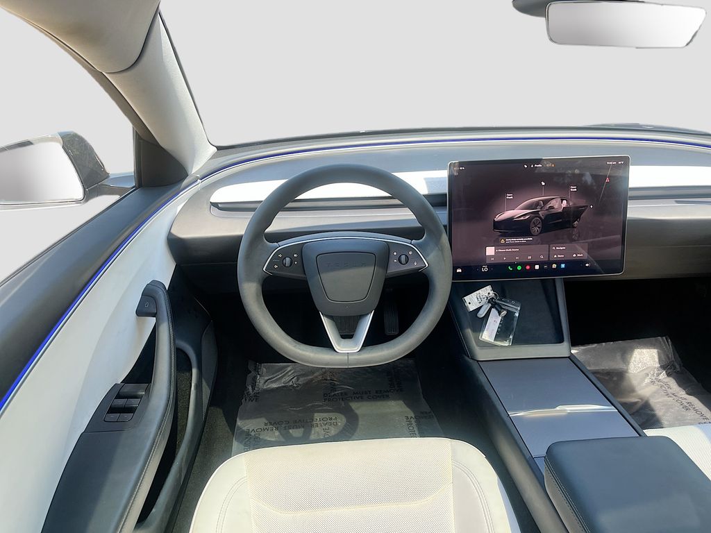 2025 Tesla Model 3 Long Range Black at AutoSavvy Houston Northwest