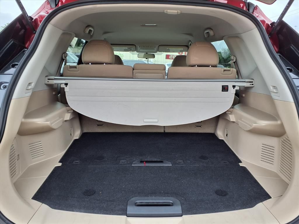 2016 Nissan Rogue SV Red at DeMontrond Gulf Freeway