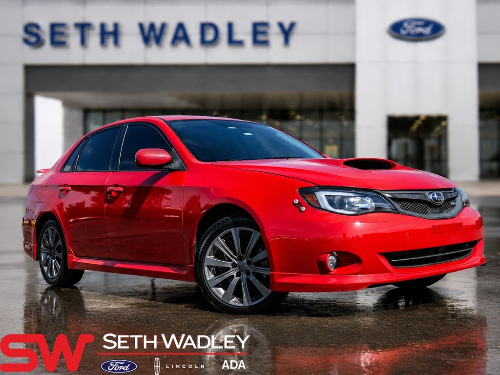 Lightning Red 2009 Subaru Impreza WRX Base Sedan All-Wheel Drive 5-Speed Manual Overdrive