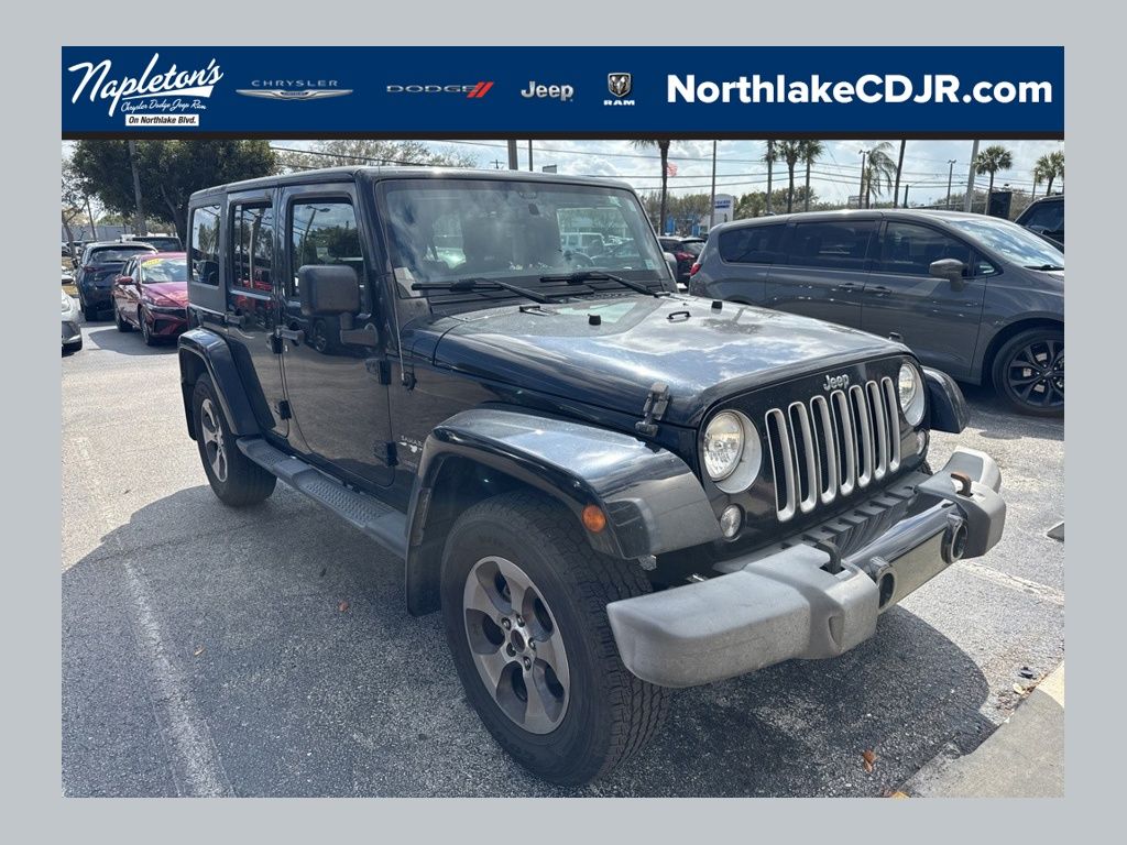 Black Clearcoat 2016 Jeep Wrangler Unlimited Sahara 4WD SUV / Crossover Four-Wheel Drive 6-Speed Manual