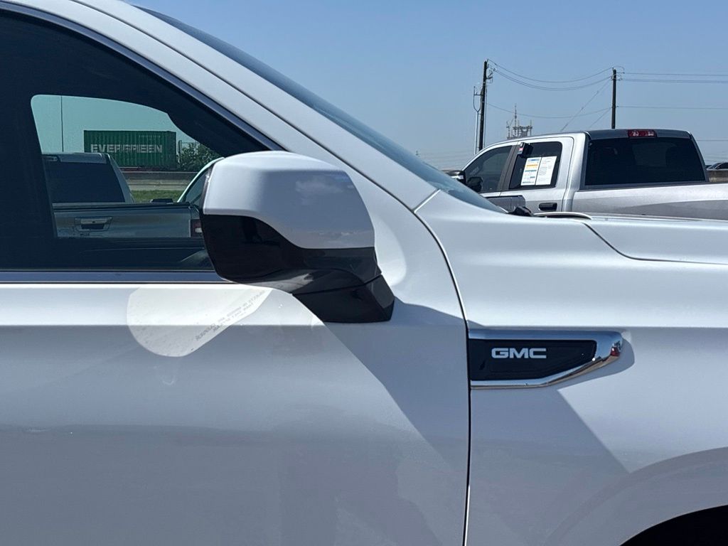 2024 GMC Yukon SLT White at Classic Elite Chevrolet Hwy 6