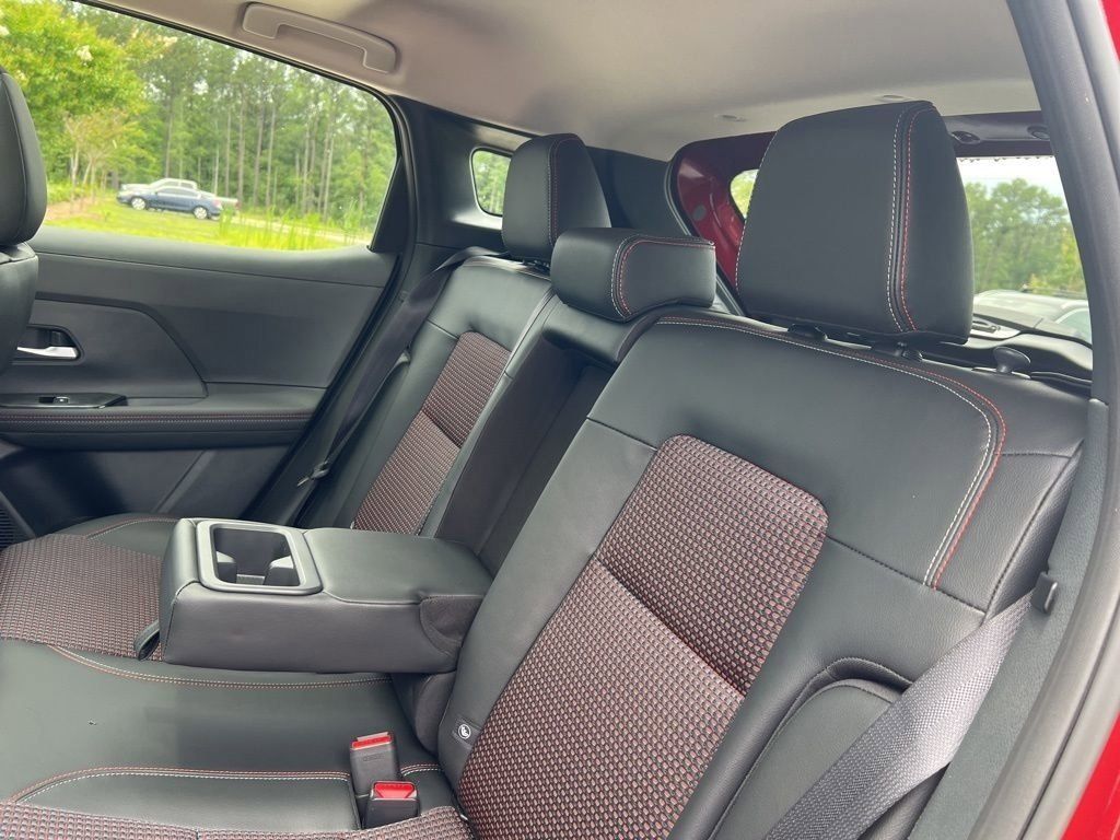 2025 Scarlet Ember Tintcoat Nissan Kicks SR FWD SUV