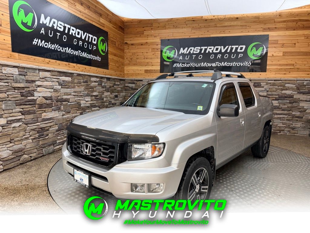 Silver 2014 Honda Ridgeline Pickup Truck Four-Wheel Drive 5-Speed Automatic