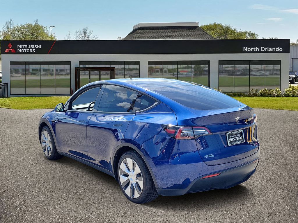 Used 2021 Tesla Model Y Standard Range with VIN 5YJYGAED9MF133380 for sale in Orlando, FL