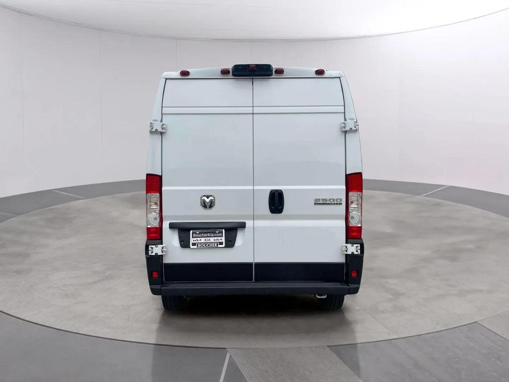 Used 2025 Bright White Clearcoat Ram High Roof image 4