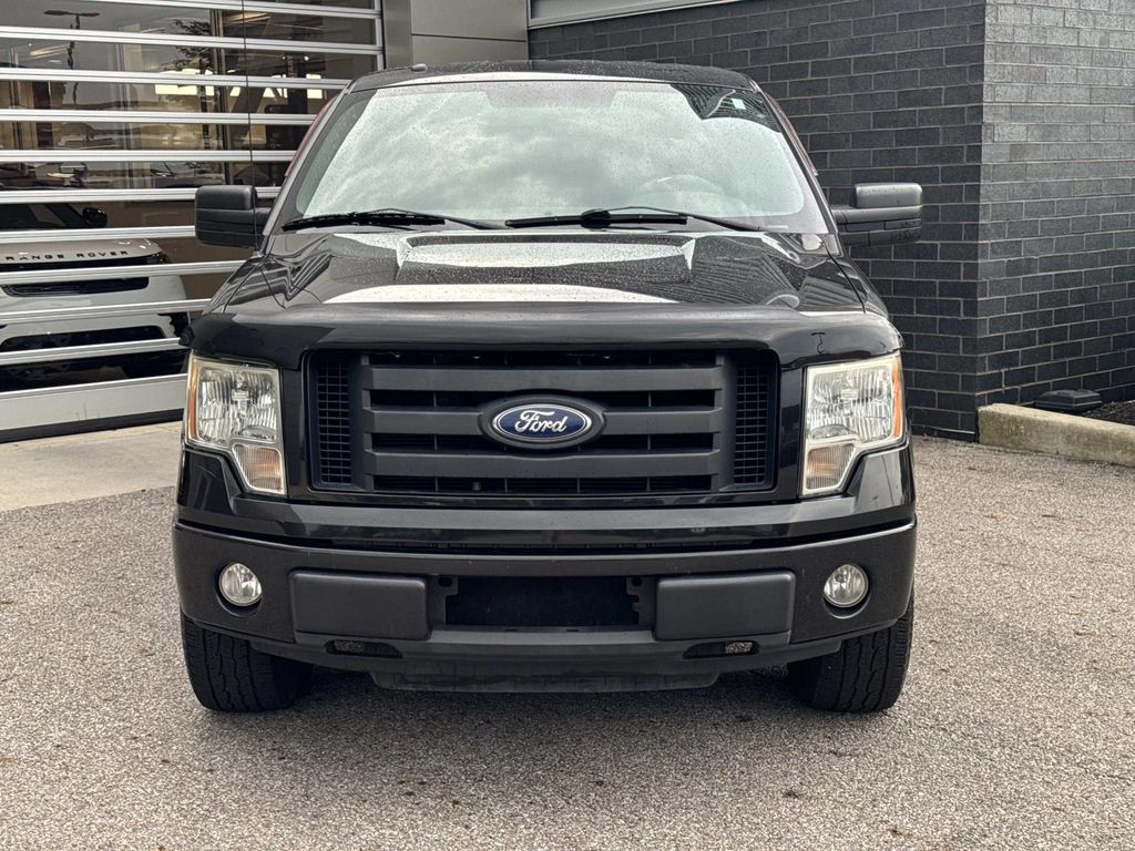 Used 2010 Black Ford STX image 2