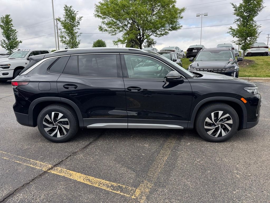 New 2026 Deep Black Pearl Volkswagen 2.0T S image 2