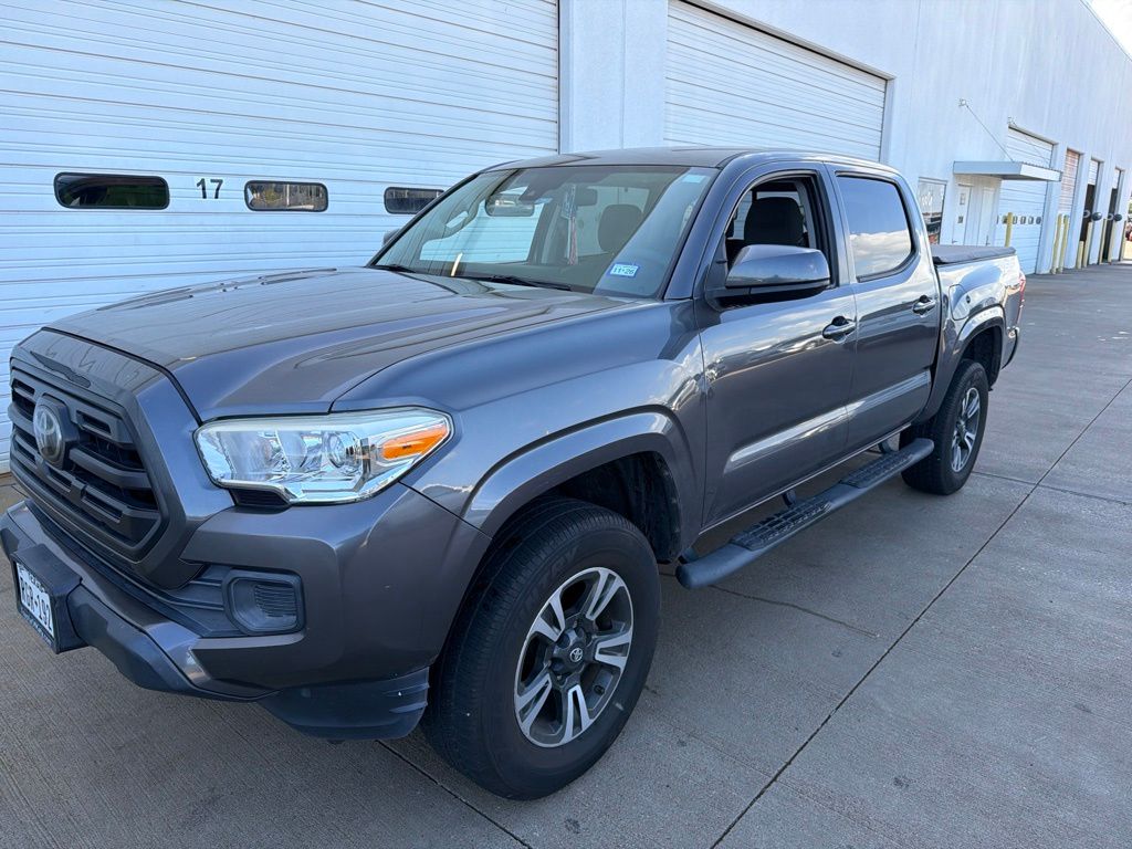 Magnetic Gray Metallic 2019 Toyota Tacoma SR I4 Double Cab RWD Pickup Truck 4X2 6-Speed Automatic