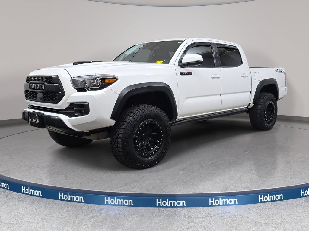 Super White 2019 Toyota Tacoma Pickup Truck Four-Wheel Drive 6-Speed Manual