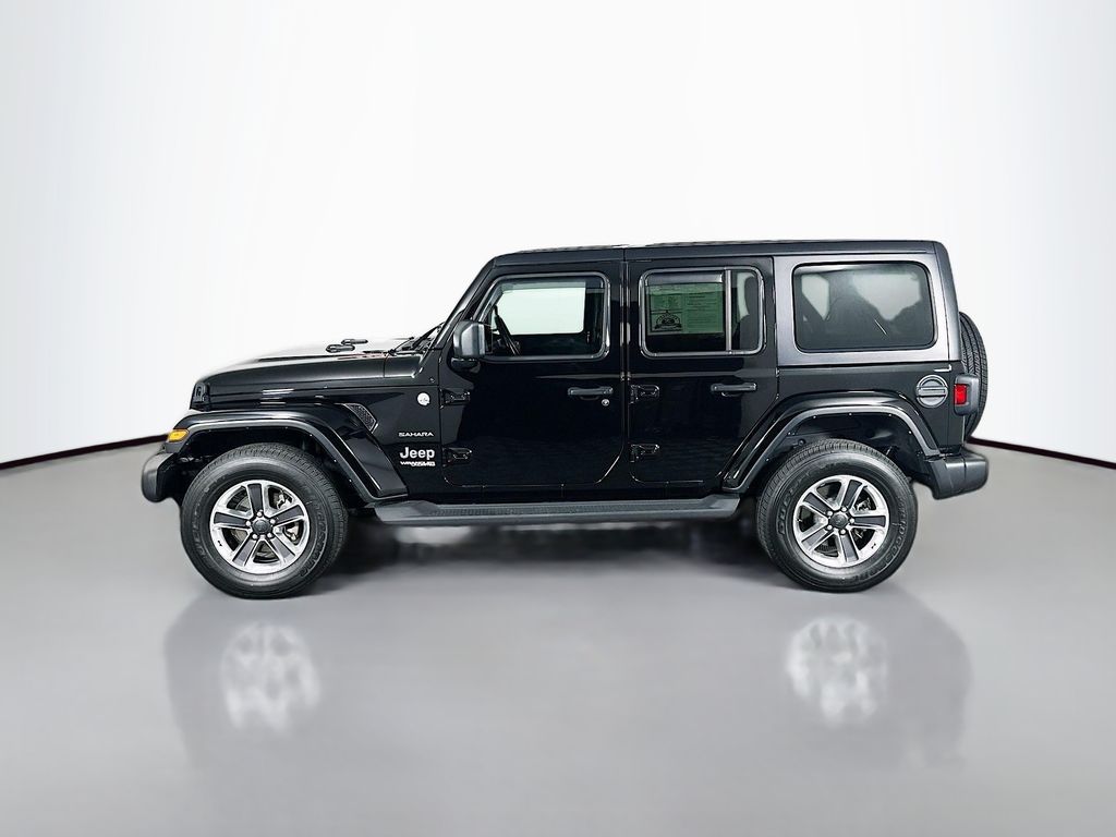 Used 2022 Black Jeep Unlimited Sahara image 4