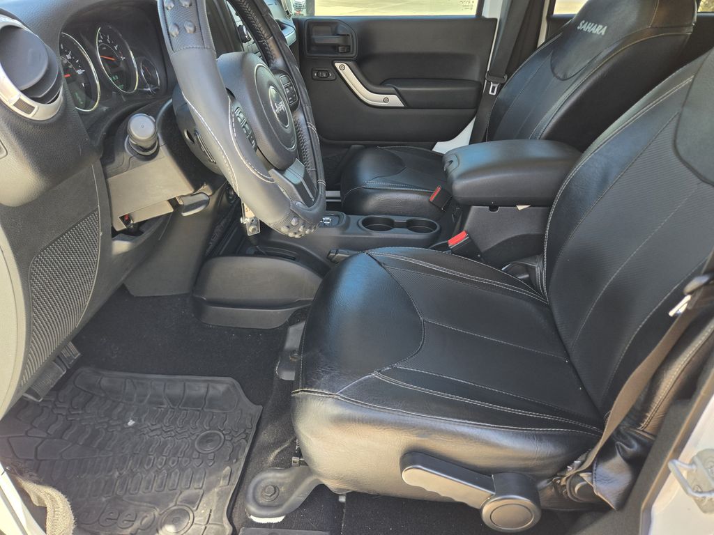 2015 Jeep Wrangler Unlimited Sahara White at DeMontrond Automotive Group