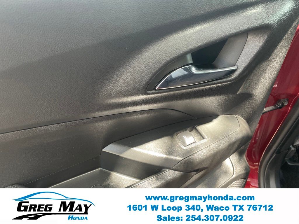 2025 Chevrolet Trax LS Red at Greg May Honda