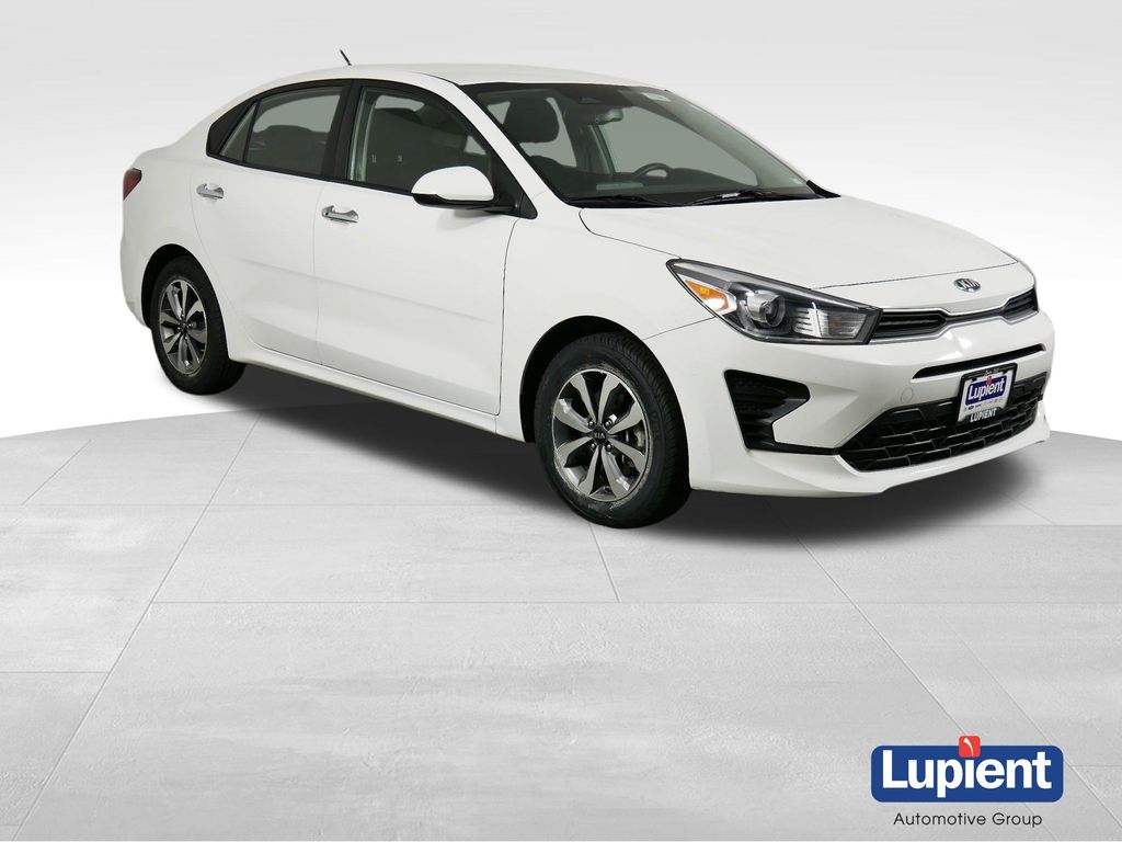 Clear White 2021 Kia Rio Sedan Front-Wheel Drive Continuously Variable Transmission