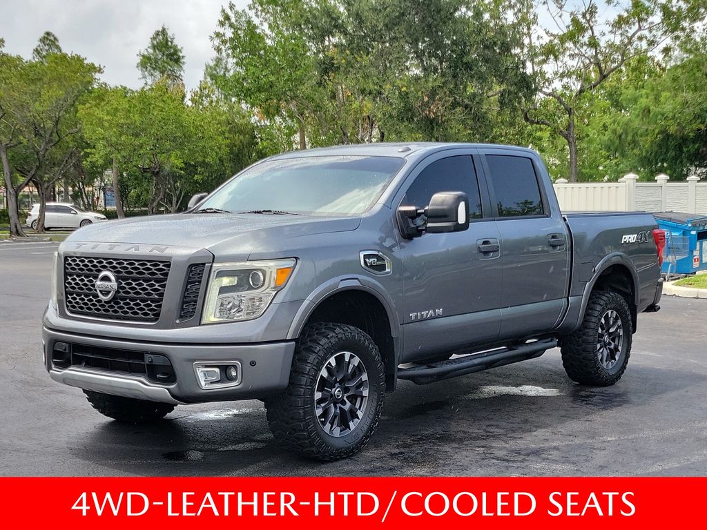 Gray (Gun Metallic) 2017 Nissan Titan Pickup Truck Four-Wheel Drive 7-Speed Automatic