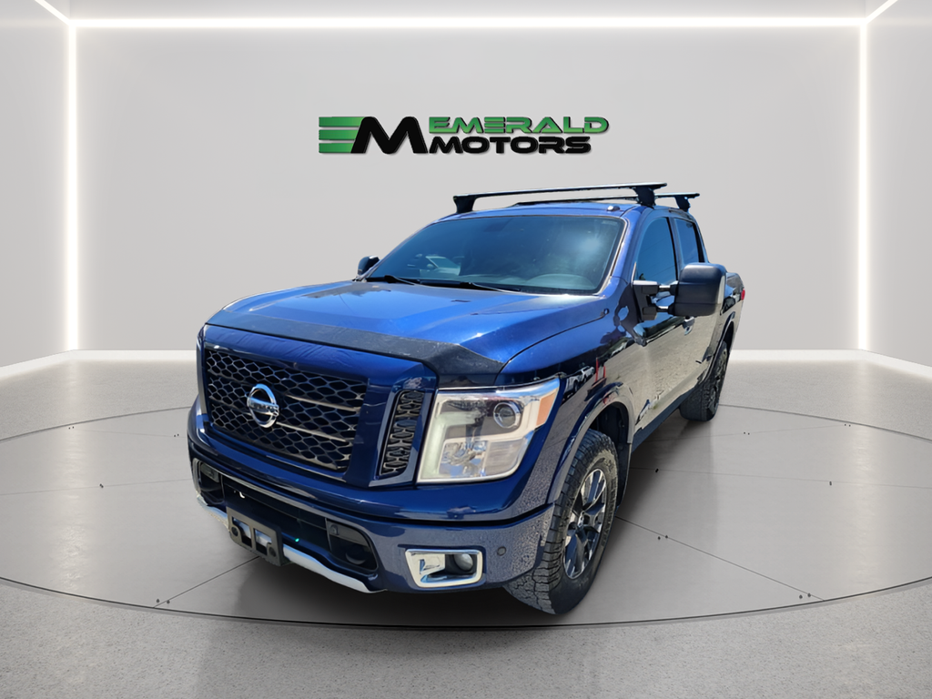 Blue 2018 Nissan Titan Pickup Truck Four-Wheel Drive 7-Speed Automatic
