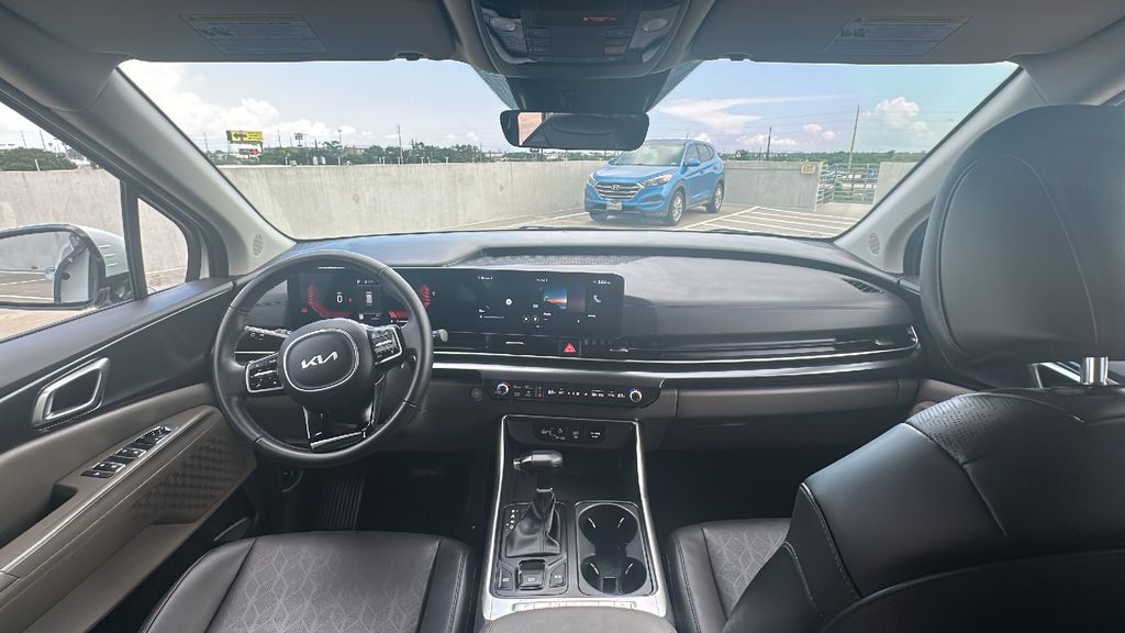 2026 Kia Carnival LXS White at DeMontrond Automotive Group