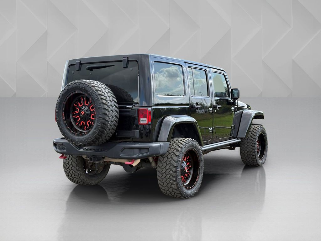 2016 Jeep Wrangler Unlimited Rubicon Black at North Houston Mitsubishi