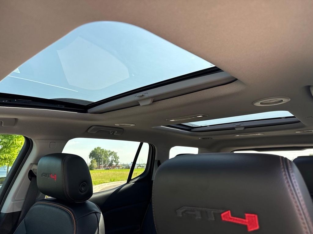 Used 2023 Ebony Twilight Metallic GMC AT4 image 7
