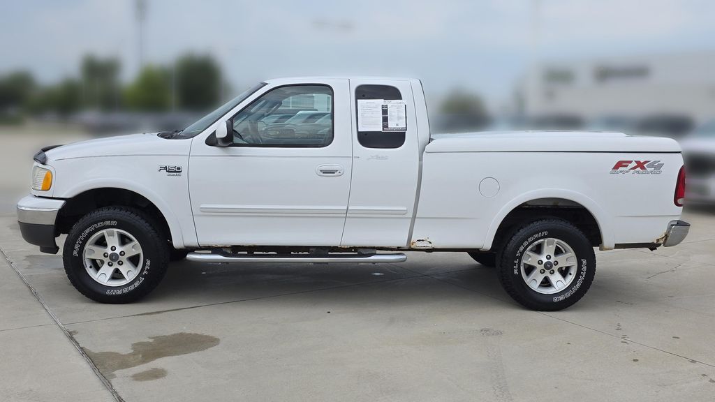 Used 2003 Ford F-150 Lariat with VIN 1FTRX18L43NB10709 for sale in Lawrence, KS