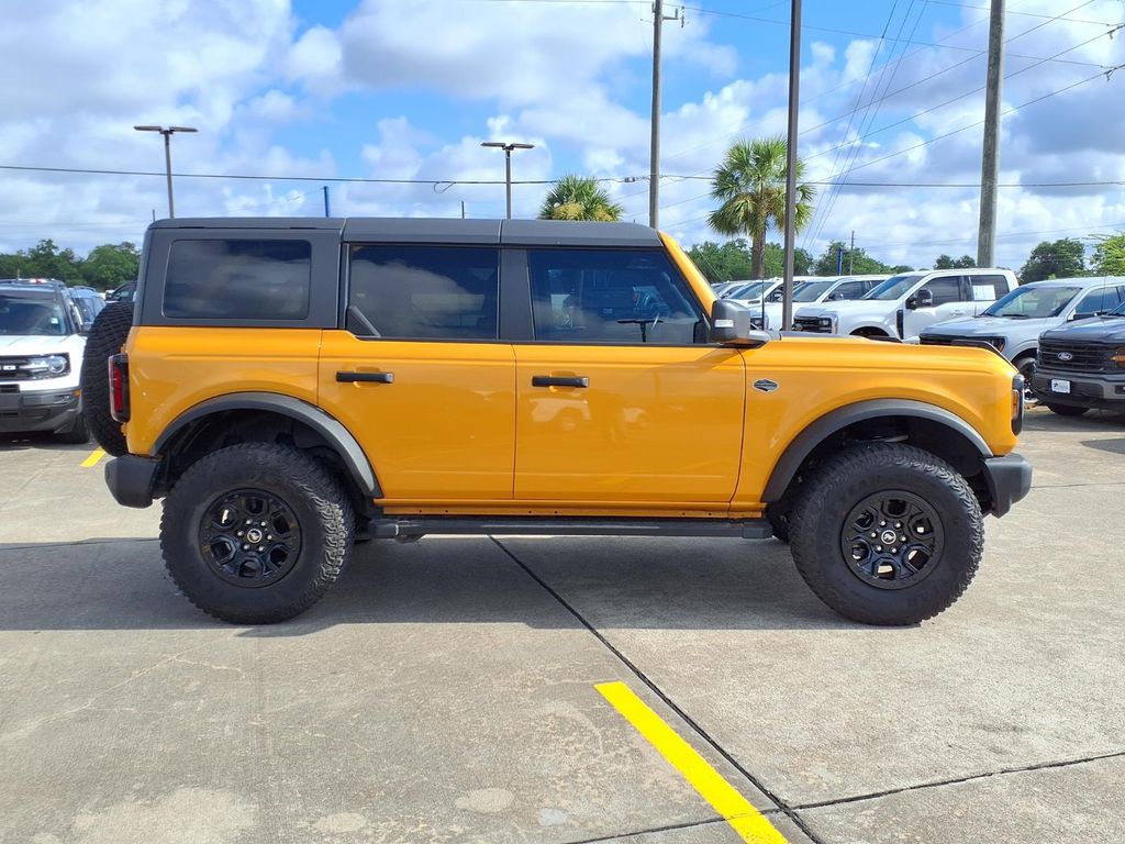 2022 Ford Bronco Wildtrak Orange at AutoSavvy Houston Northwest