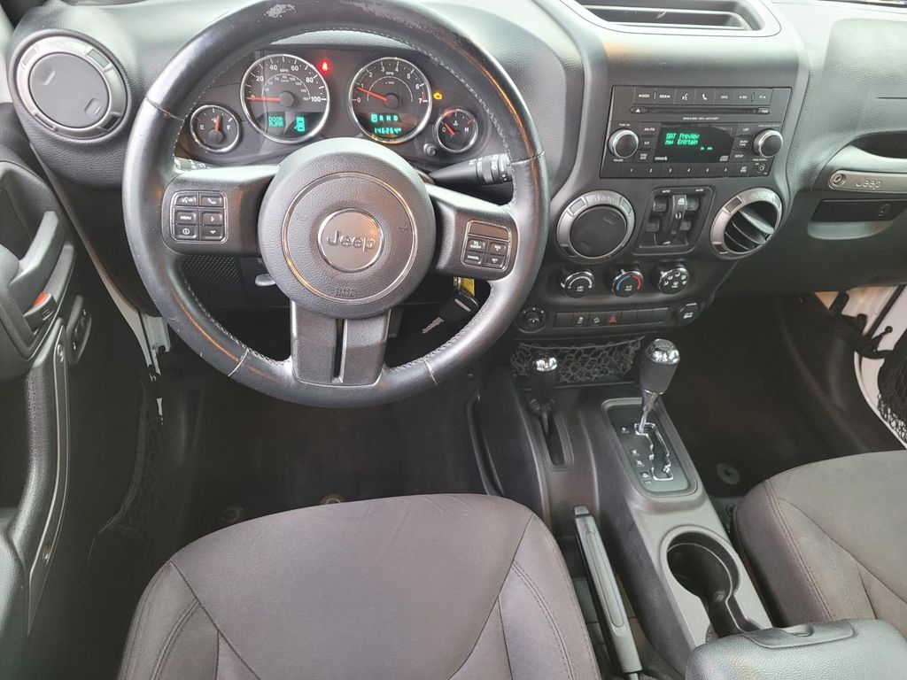 used 2015 Jeep Wrangler car, priced at $13,900