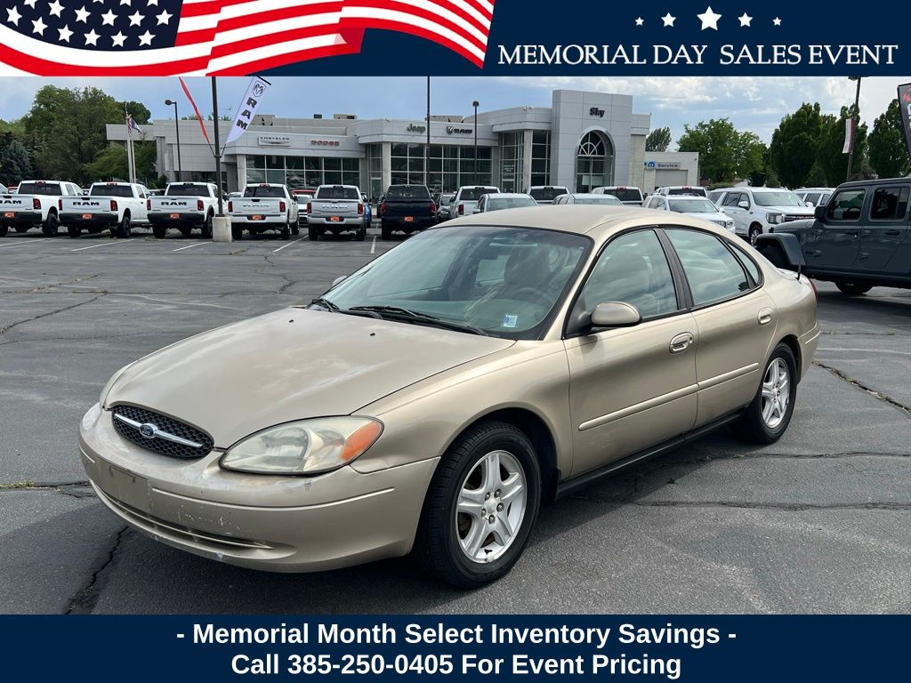 Gold 2000 Ford Taurus SEL Sedan Front-Wheel Drive 4-Speed Automatic Overdrive