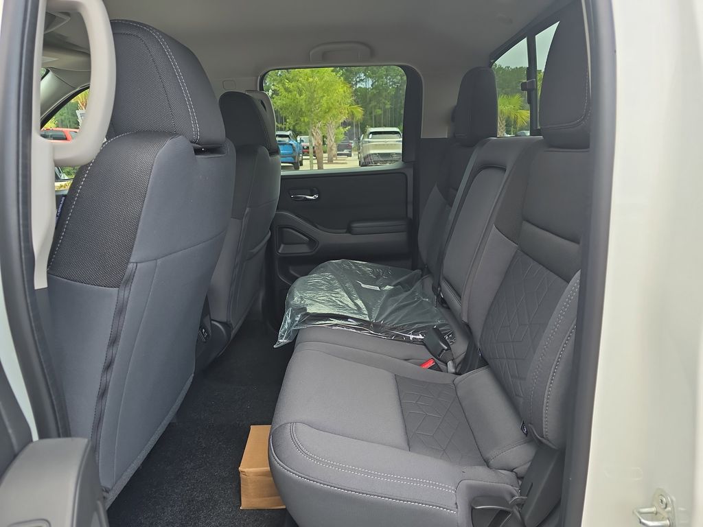 2025 Glacier White Nissan Frontier SV 4X4 Truck