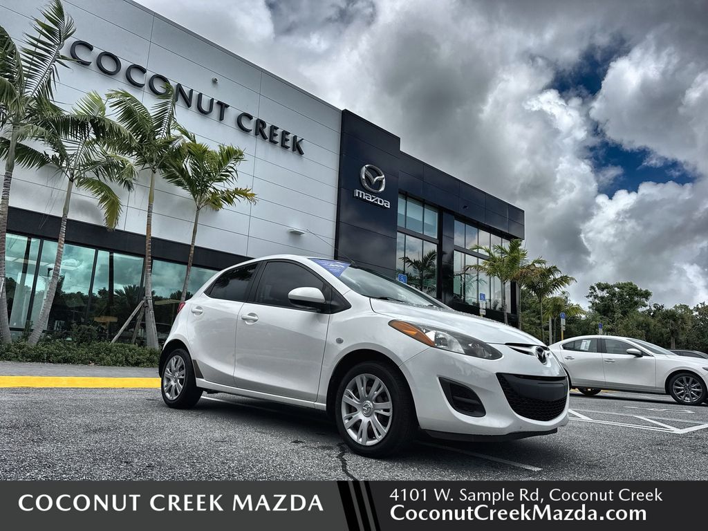 Crystal White Pearl 2012 Mazda MAZDA2 Sport Hatchback Front-Wheel Drive 4-Speed Automatic