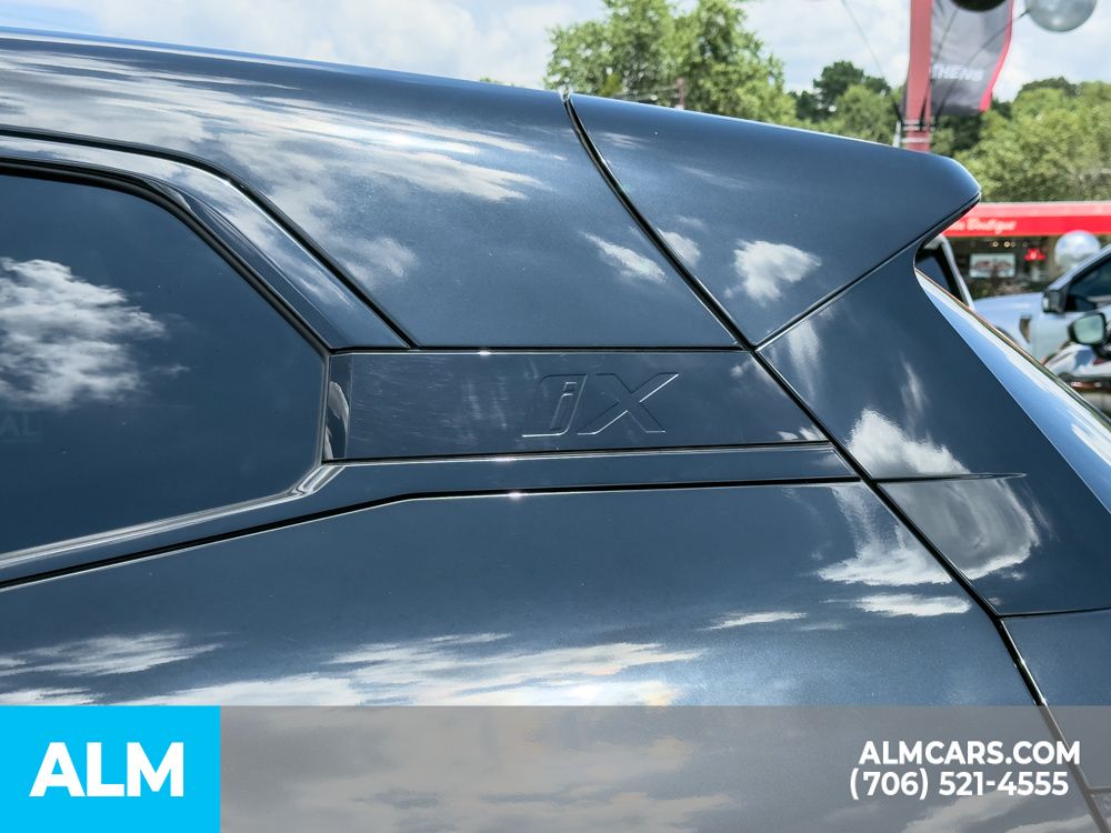 Used 2024 Black BMW xDrive50 image 14