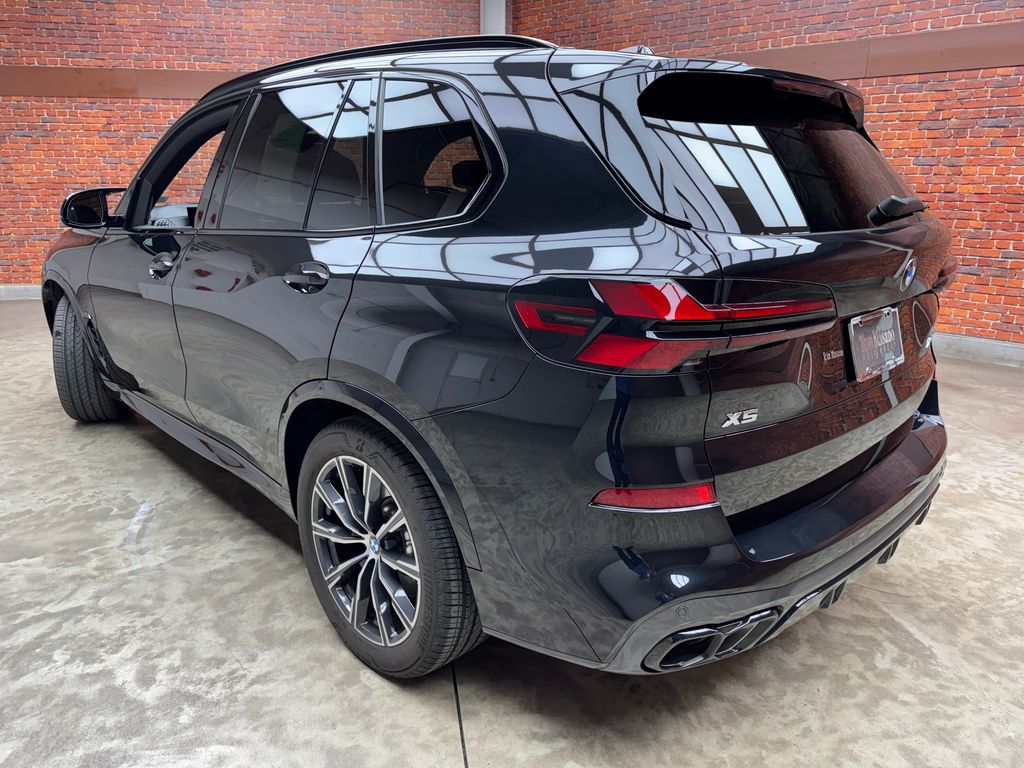 Certified Used 2025 Black BMW M60i image 2