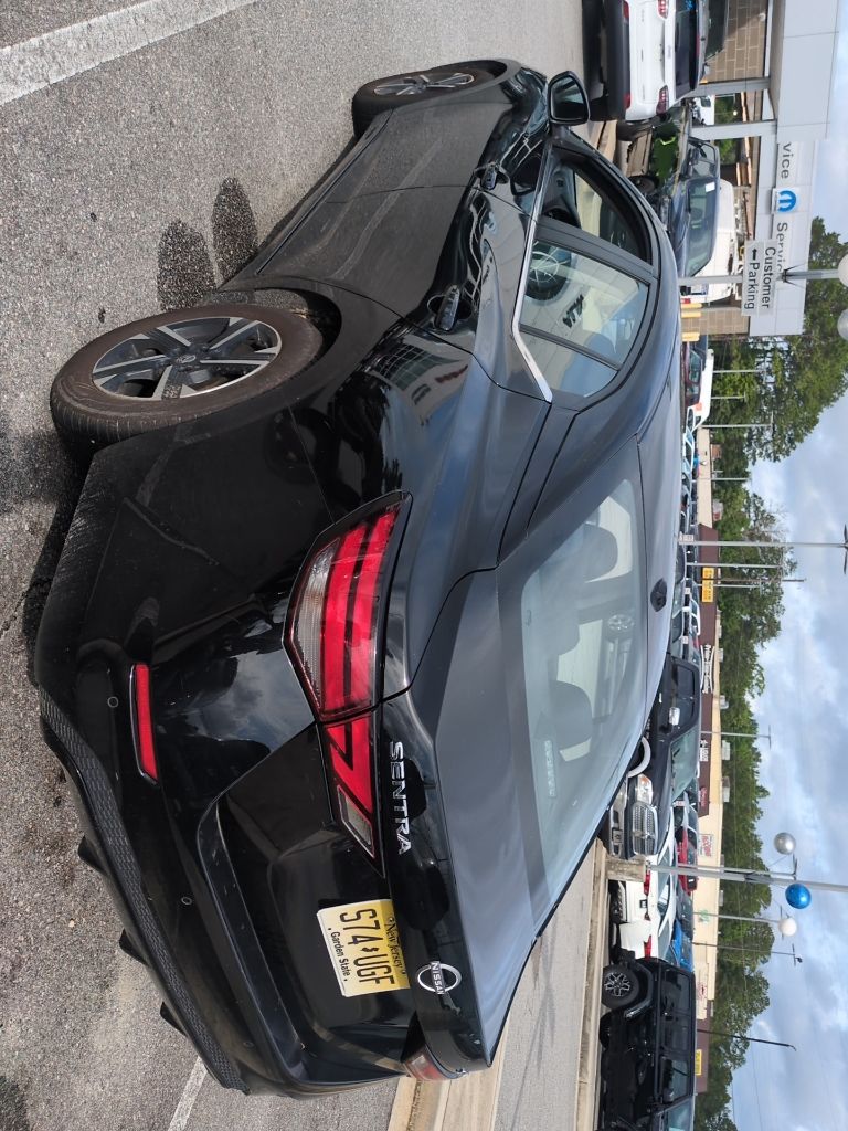 Used 2024 Black Nissan SV image 6
