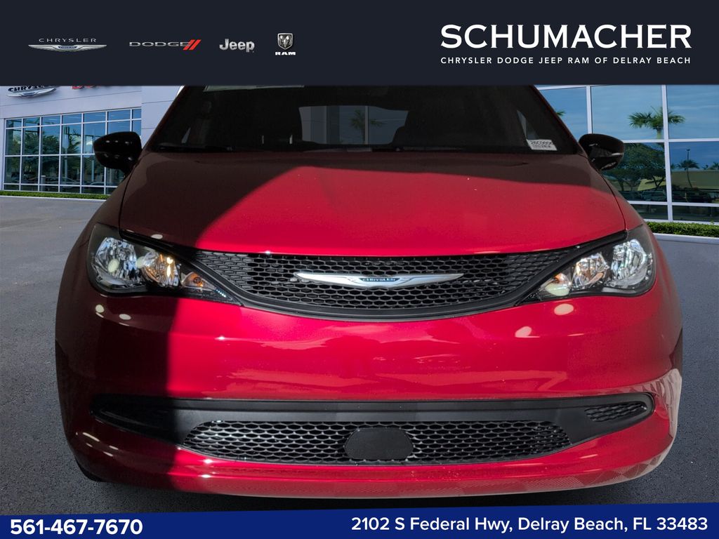 View vehicle photo 3