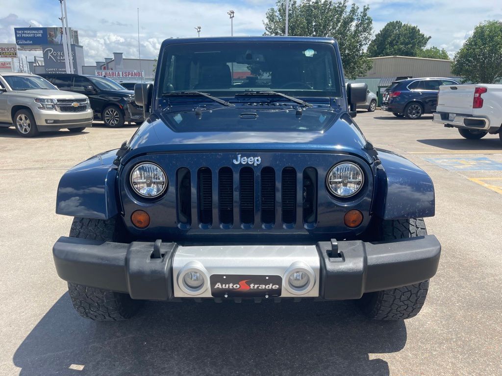 2013 Jeep Wrangler Unlimited Sahara Blue at Emmons Autoplex