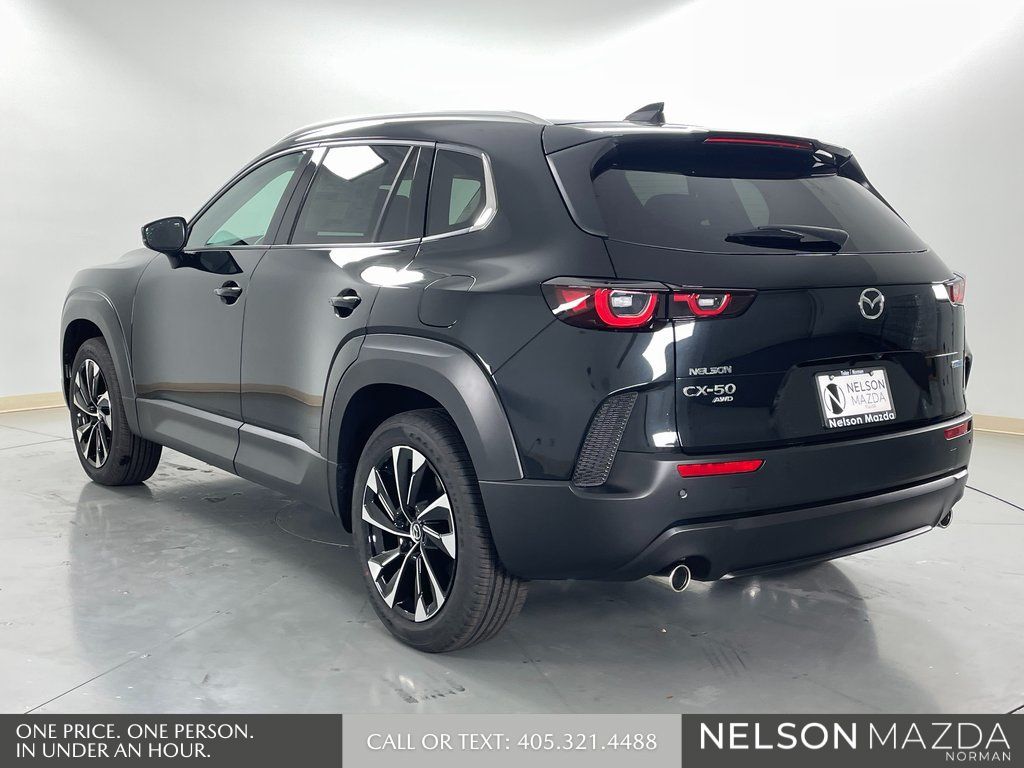 New 2026 Black Mazda Premium Plus image 8