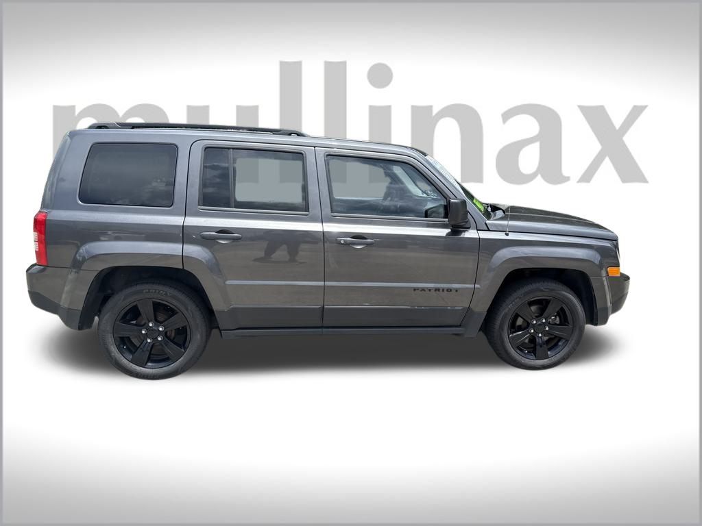 Used 2014 Jeep Patriot Sport with VIN 1C4NJPBA9ED790402 for sale in New Smyrna Beach, FL