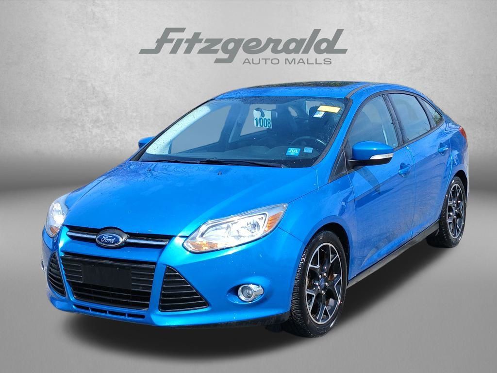 Blue Candy Tinted Clearcoat 2014 Ford Focus SE Sedan Front-Wheel Drive 6-Speed Automatic