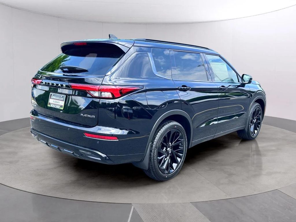 New 2026 Cosmic Black Nissan Platinum image 3