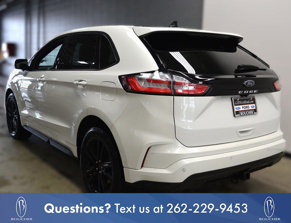 Used 2022 Star White Metallic Tri-Coat Ford ST Line image 4