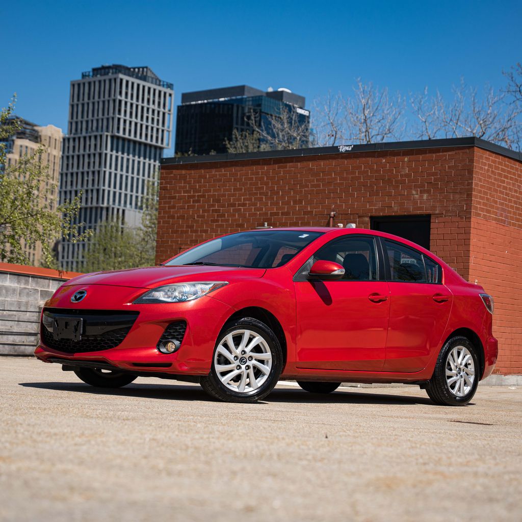 Velocity Red Mica 2013 Mazda MAZDA3 i Grand Touring Sedan Front-Wheel Drive 6-Speed Manual