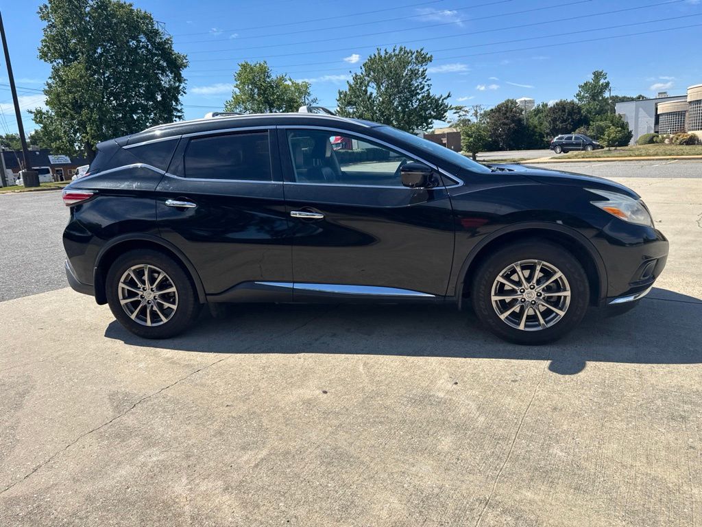 Used 2016 Black Nissan SL image 4