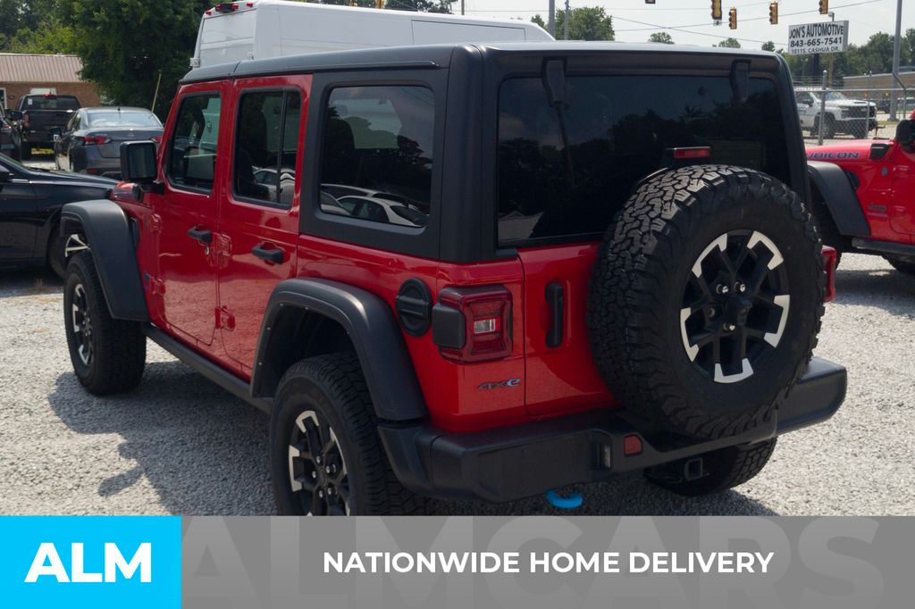 Used 2024 Red Jeep Rubicon 4xe image 4
