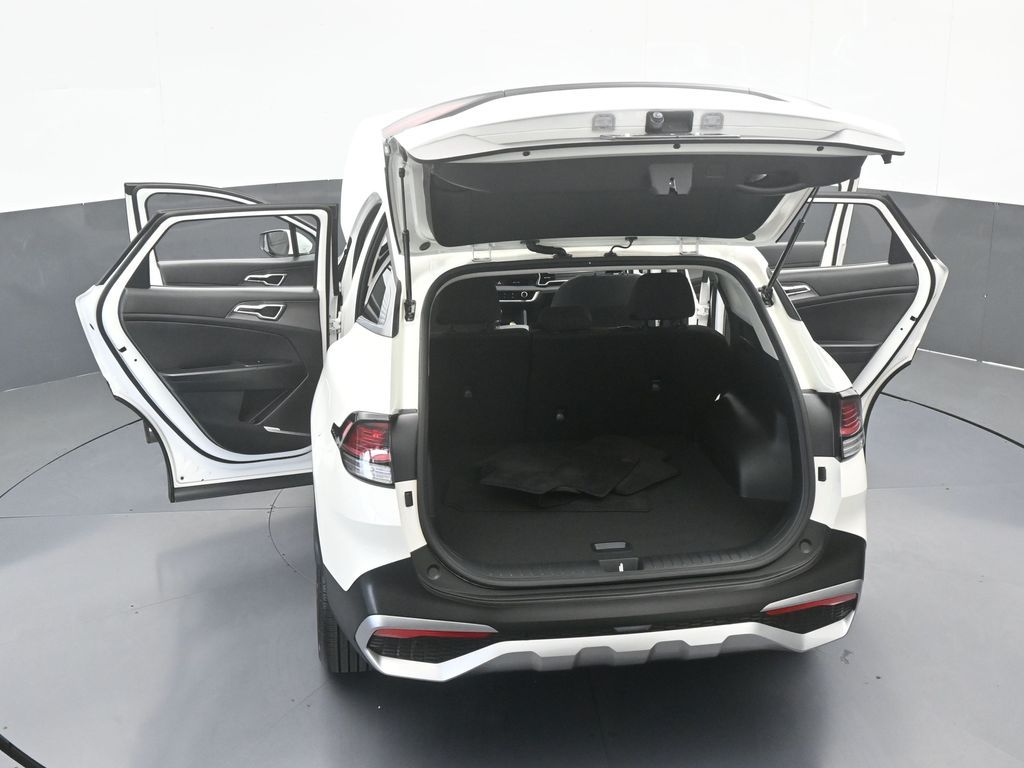 Used 2025 Snow White Pearl Kia LX image 61