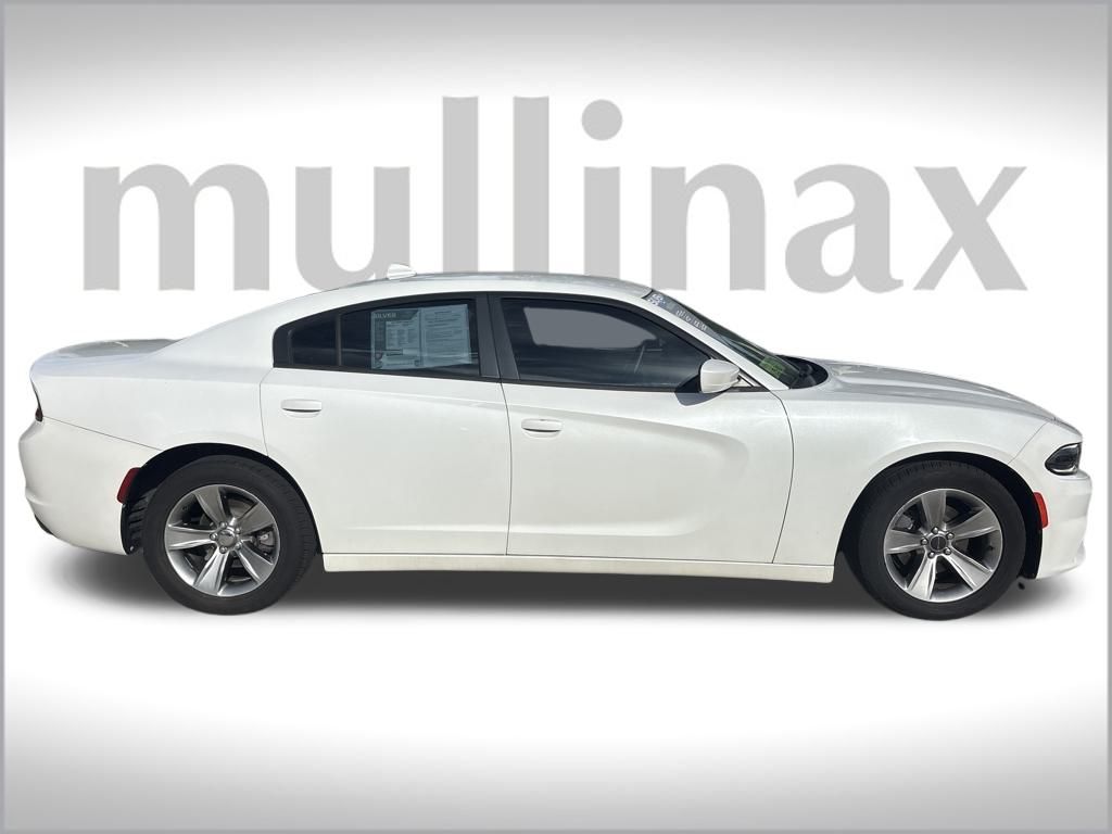 Used 2015 Dodge Charger SXT with VIN 2C3CDXHG6FH869982 for sale in New Smyrna Beach, FL