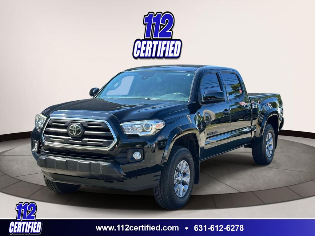 Midnight Black Metallic 2018 Toyota Tacoma Pickup Truck Four-Wheel Drive 6-Speed Automatic